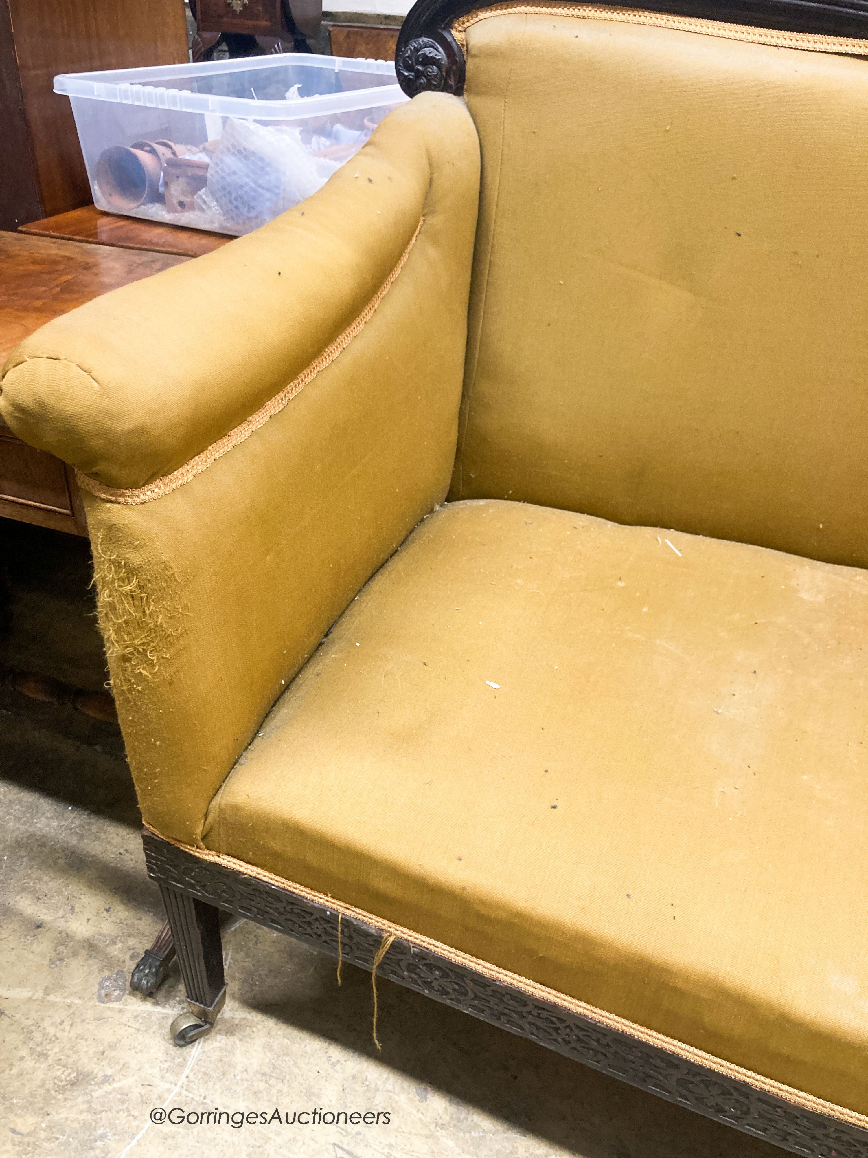 A Regency ebonised settee, W.162cm D.70cm H.120cm